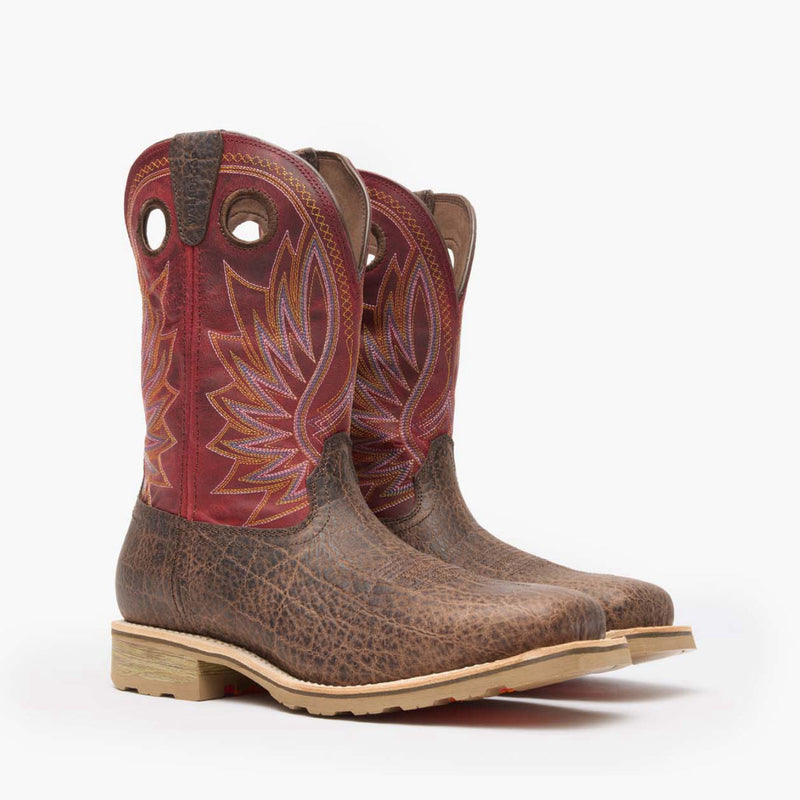 Front view of a pair of Durango Maverick Pro work boots with elephant embossed brown leather and red shaft design
