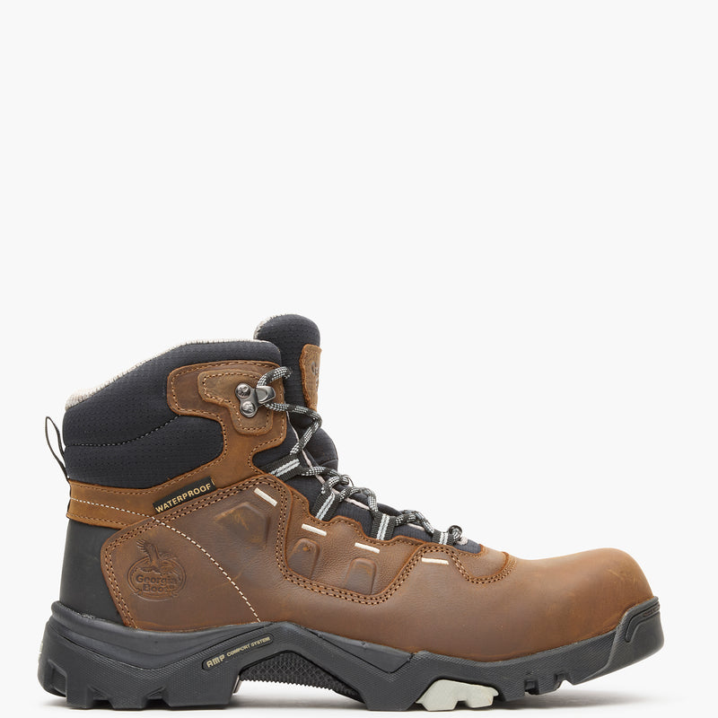 Brown hiking boot with black accents on a white background