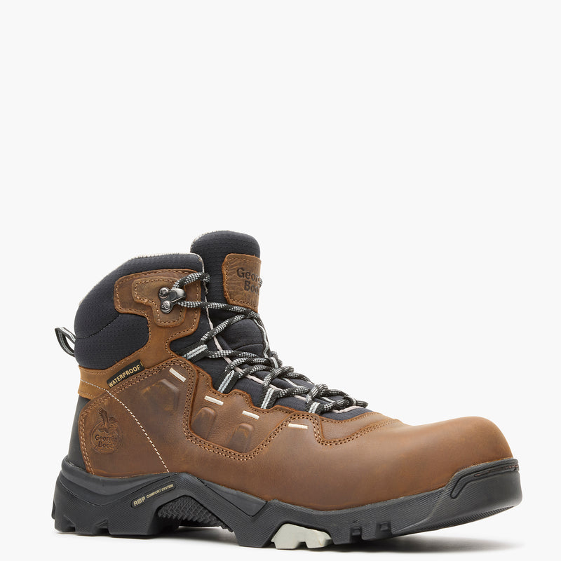 Brown hiking boot with black accents on a white background