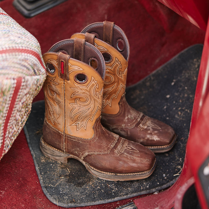Durango pull on work boot with dirt on the truck floor