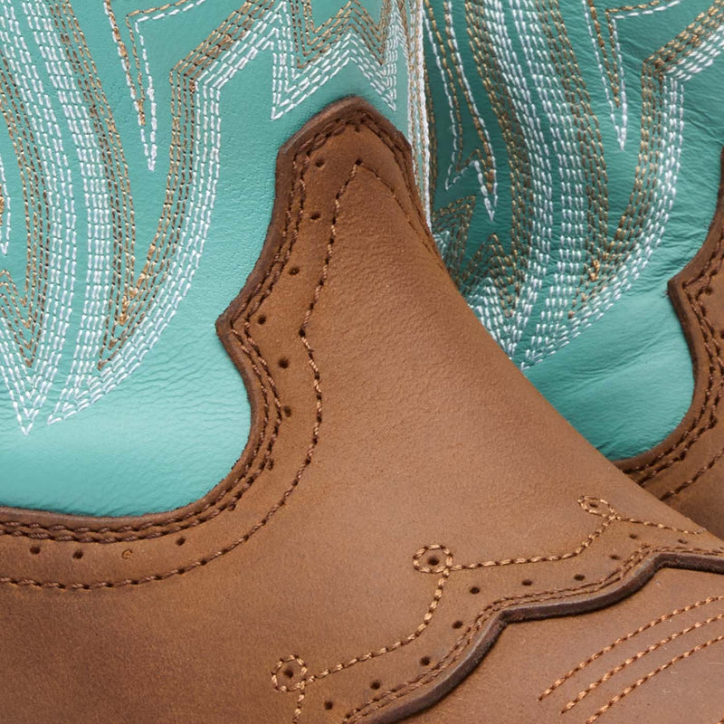 Close-up of brown leather Durango boot with powder blue shaft and intricate stitching
