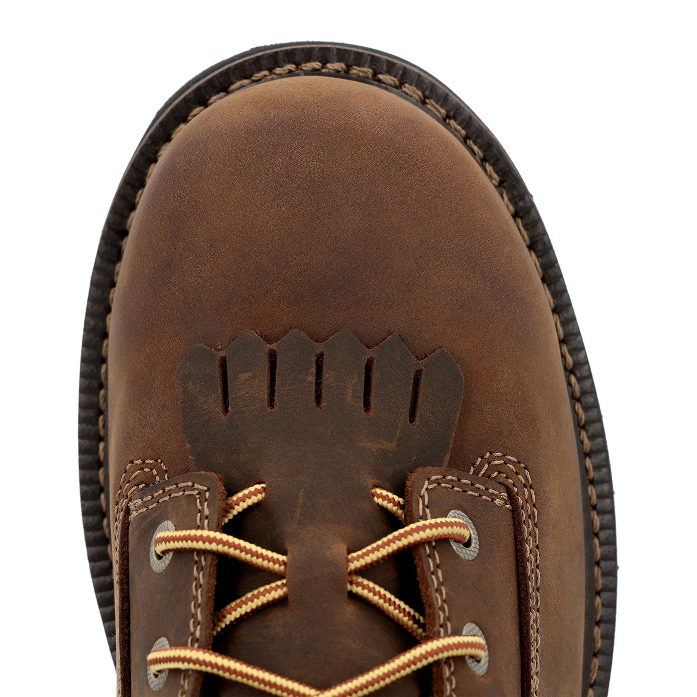 Close-up of a brown leather boot with laces on a white background
